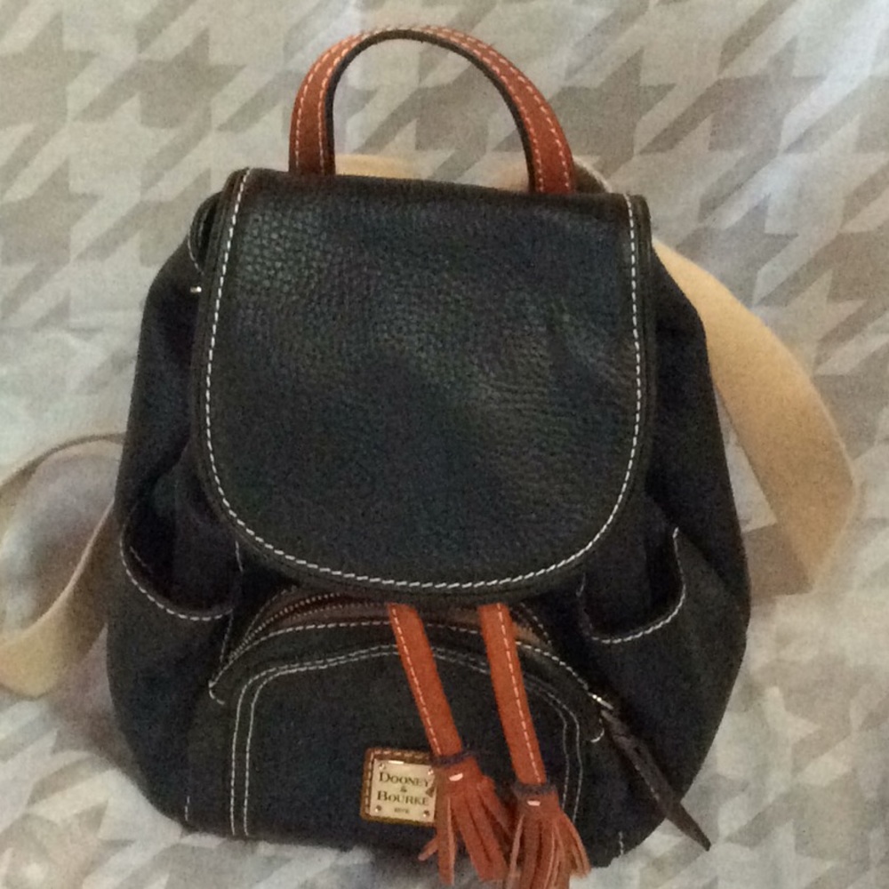Dooney & Bourke mini backpack used only once!